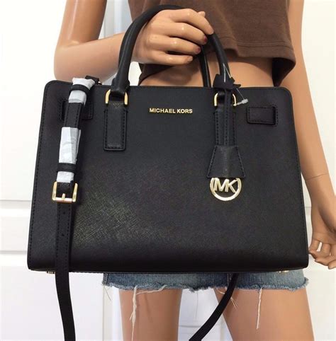 michael kors purse black with gold|gold Michael Kors tote bag.